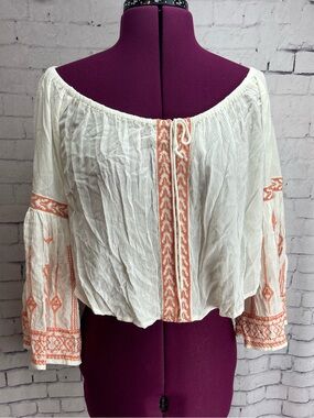 L Space size small Crawford off the shoulder top cream with orange embroidery